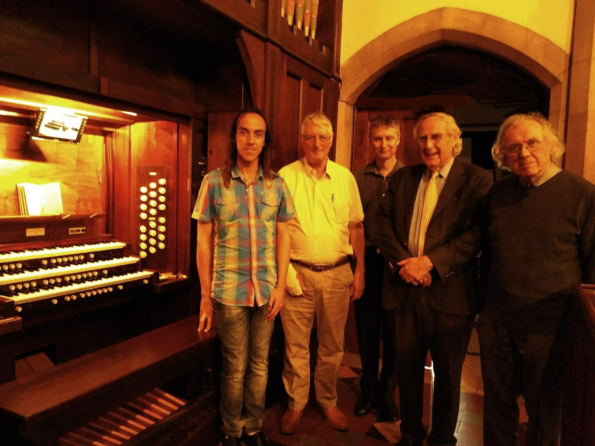 Image: recitalists by the console